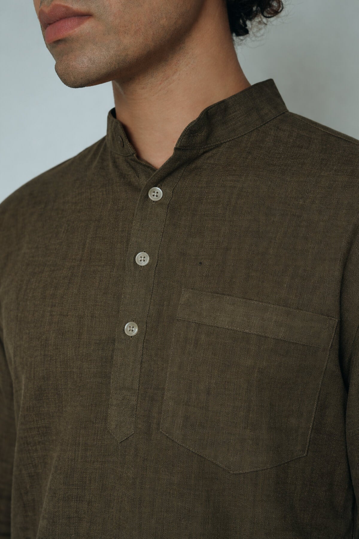 Heena olive green premium linen short kurta by Mr.Saa (Mr.सा)
