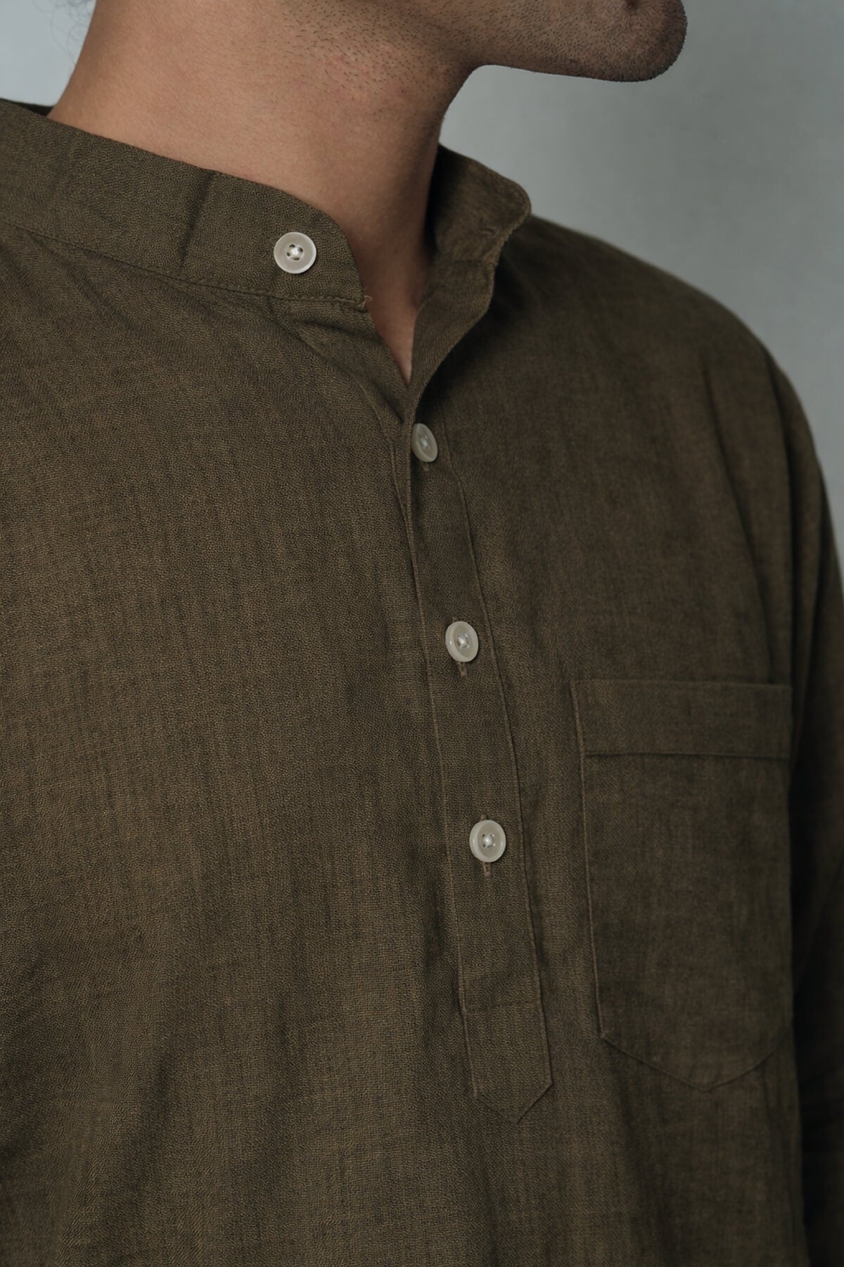 Heena olive green premium linen short kurta by Mr.Saa (Mr.सा)